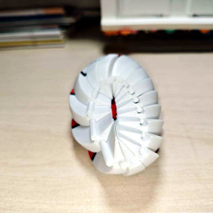 Interlocking spiral segments of the 3D printed Poke Ball