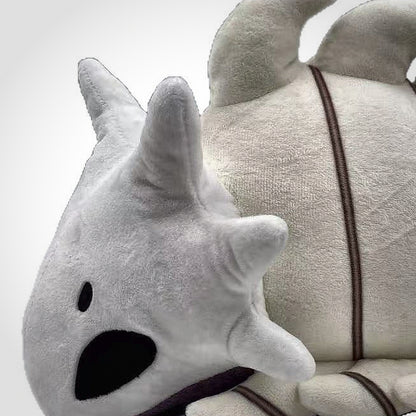 Close up of Bell Beast plush head spikes and short pile fabric