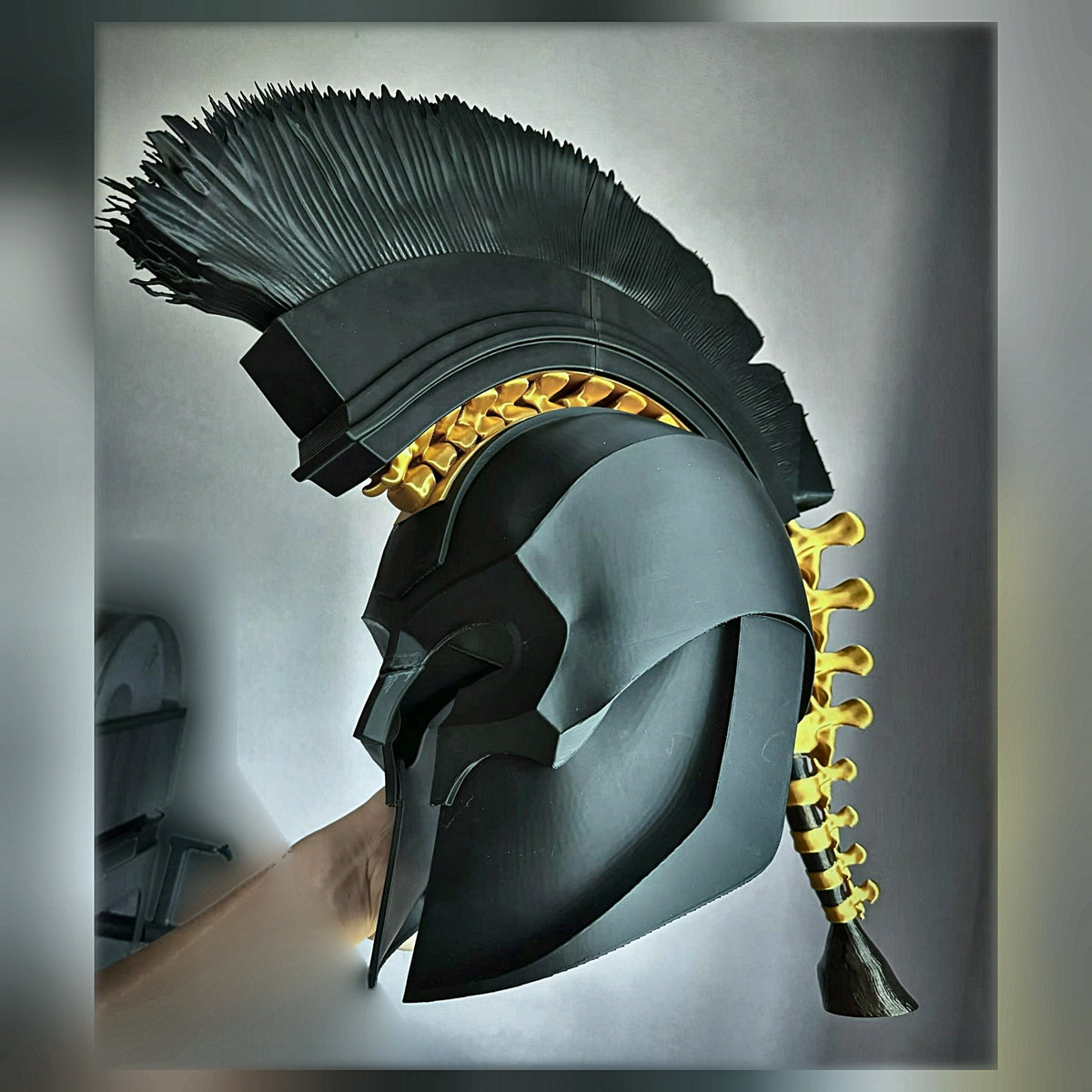 Side profile of the Corinthian helmet showing the nose guard and cheek plates