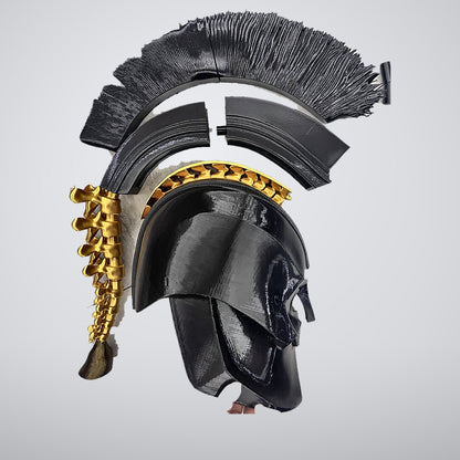 All parts laid out: helmet shell, crest segments and gold spine