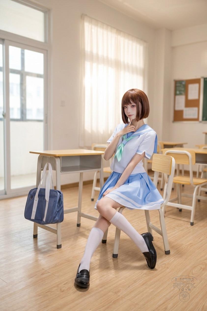 Sailor uniform cosplay set - green scarf version, seated at a desk