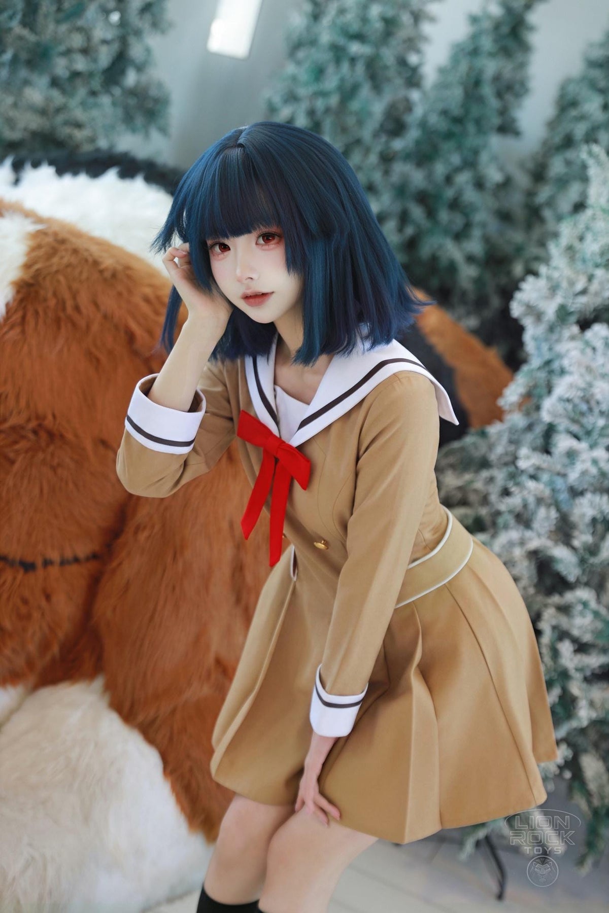 Khaki sailor dress with red bow close up