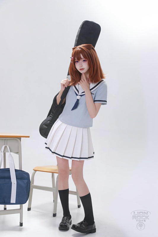 Light blue sailor top and white pleated skirt cosplay