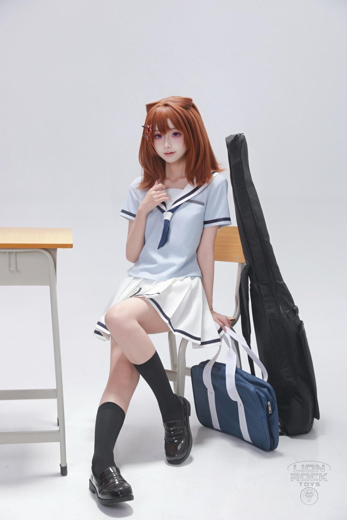 Summer sailor uniform cosplay seated