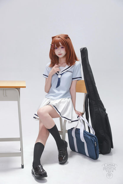 Summer sailor uniform cosplay seated