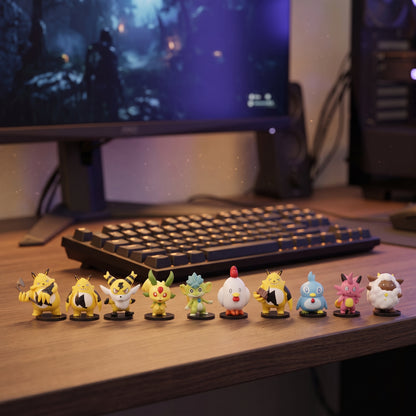 Palworld mini figures lined up along a gaming desk with keyboard and monitor