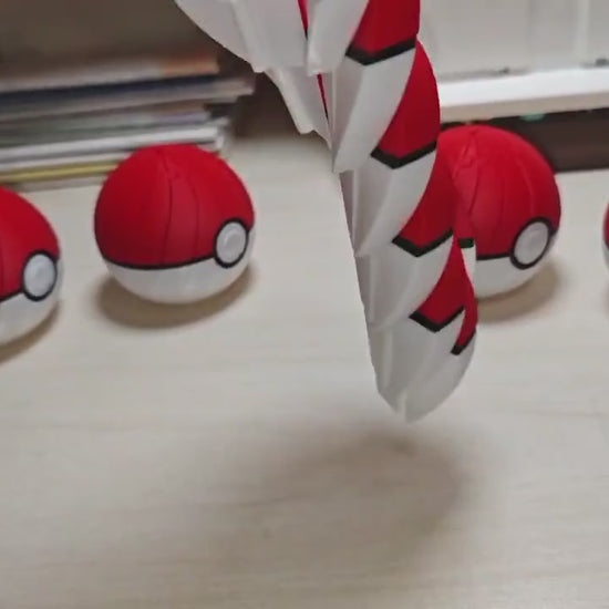 Poke Ball spiral fidget twisting open into a spiral and back