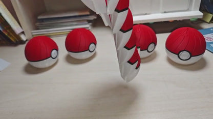 Poke Ball spiral fidget twisting open into a spiral and back