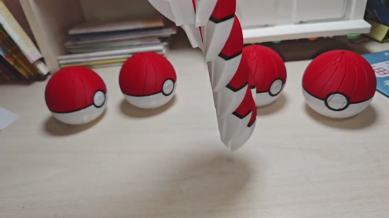 Poke Ball spiral fidget twisting open into a spiral and back