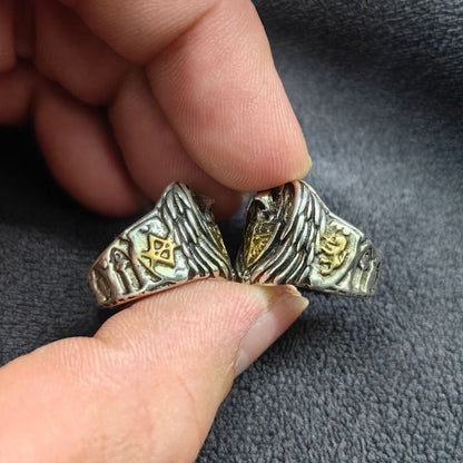 Gothic skull signet ring worn on hand