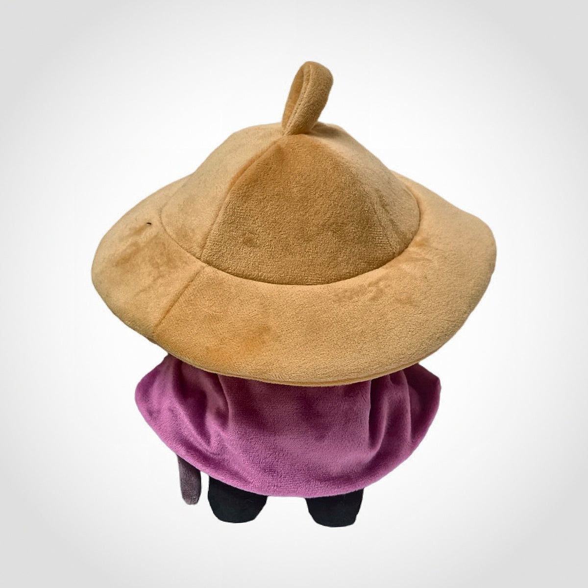 Sherma plush from behind showing hat top and plum cloak